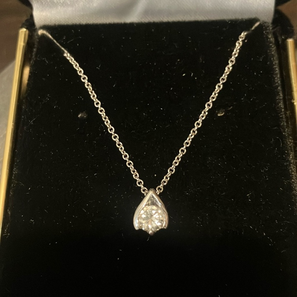 Radiant round cut diamond solitaire pendant